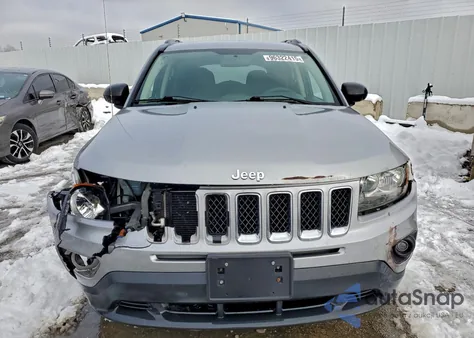 2015 Jeep Compass Sport z USA, uszkodzony, nr VIN 1C4NJCBA8FD262411